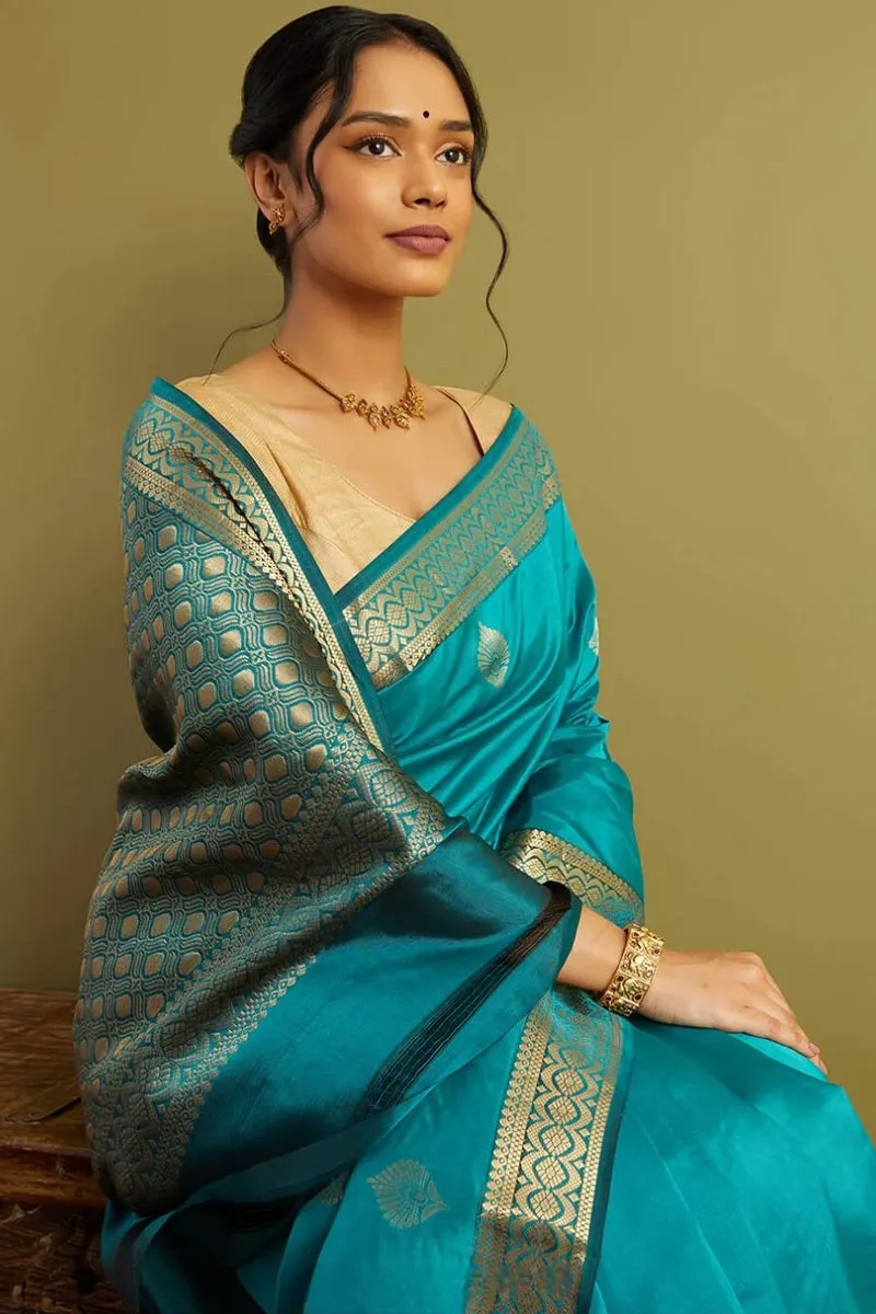 Pleasant Firozi Soft Silk Saree With Demure Blouse Piece