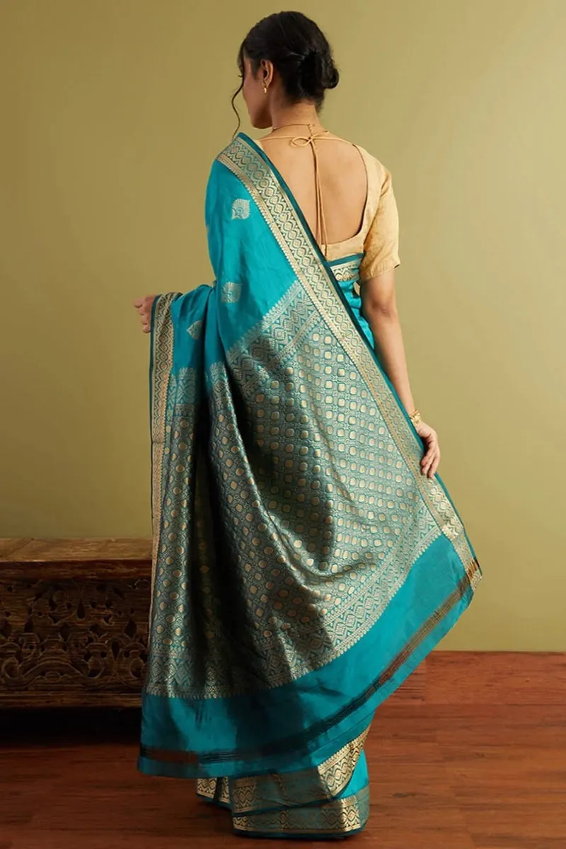 Pleasant Firozi Soft Silk Saree With Demure Blouse Piece