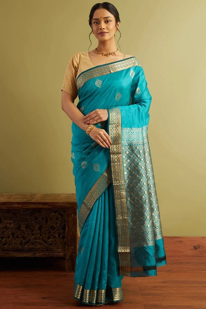 Pleasant Firozi Soft Silk Saree With Demure Blouse Piece